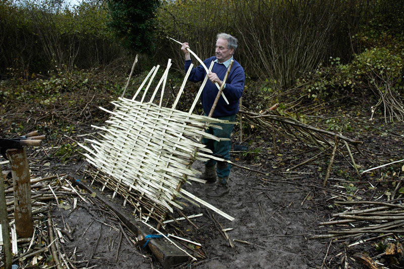 Weaving the split rods in and out of the sails